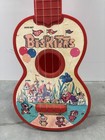 Vintage 1984 Ohio Art "The Biskitts" toy guitar — photo 2