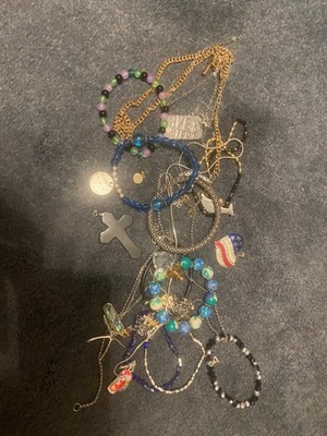 a bag of jewelry with necklaces, chains, bracelets, never worn much