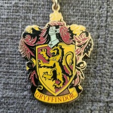 Harry Potter - Cresta de Gryffindor - Llavero Mochila Clip Metal Universal Studios