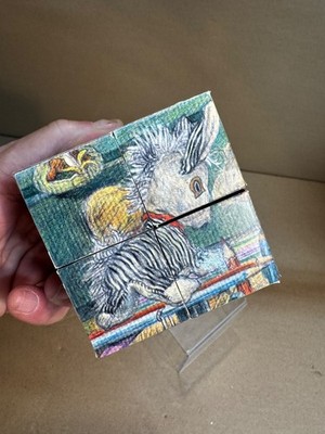 The puzzle is a 2x2 cube variation, Animals birds etc. BLOCK PUZZLE