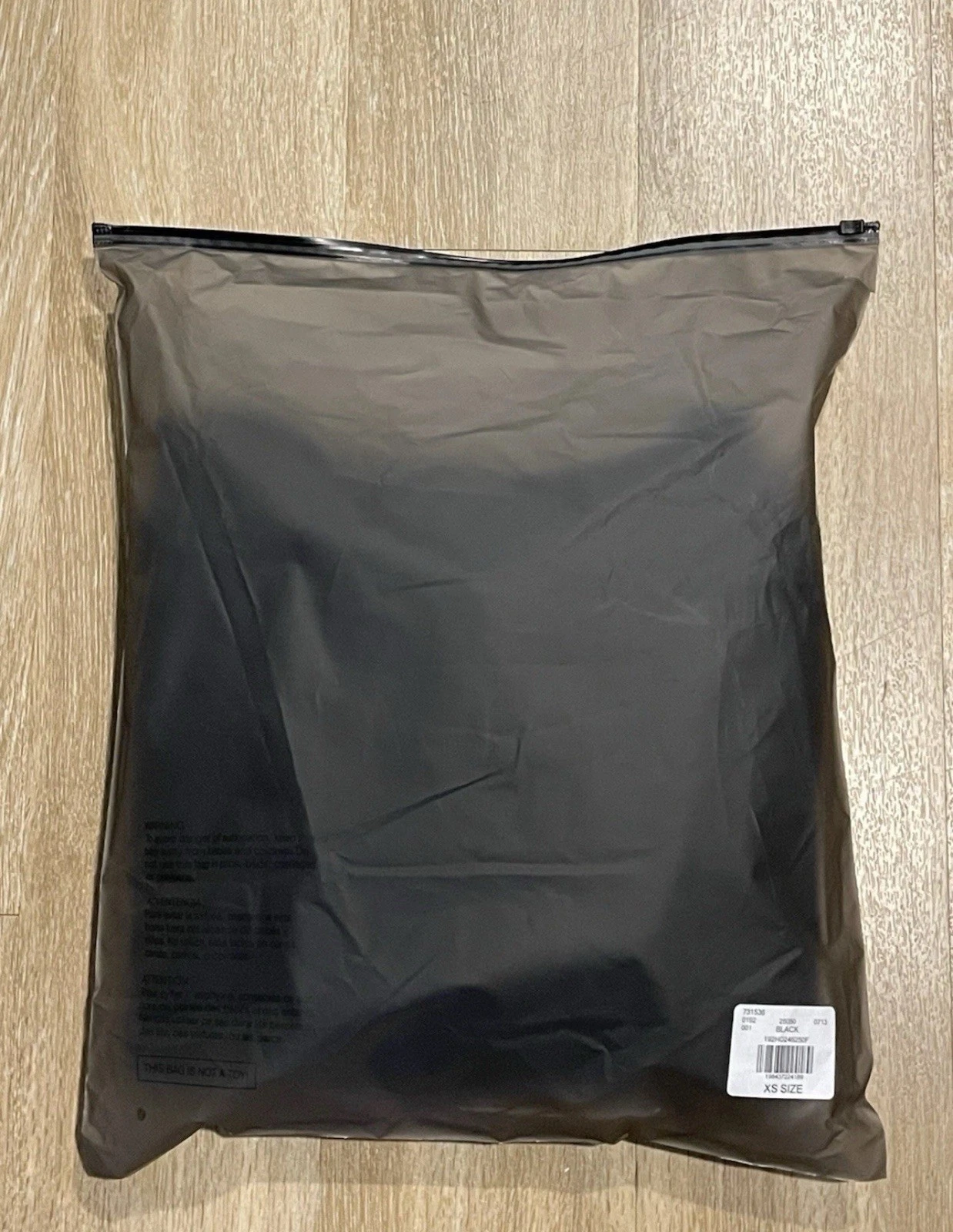 Felpa con cappuccio Fear of God Essentials in pile nera bianca FW24 taglia XS extra small mai indossata