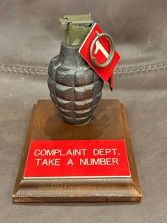 Gag gift for office desk Fake Grenade Complaint Dept.