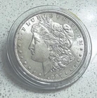 1897 MORGAN SILVER DOLLAR IN BU PROOF LIKE CONDITION in Plastic Holder