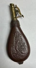 BROWN GUN POWDER STRIPED BROWN LEATHER COVERED FLASK.