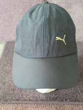 PUMA Hat Black and blue pattern with Metal Puma Logo on the front. strap back