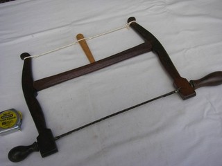Ornate Frame Bow Saw not named.