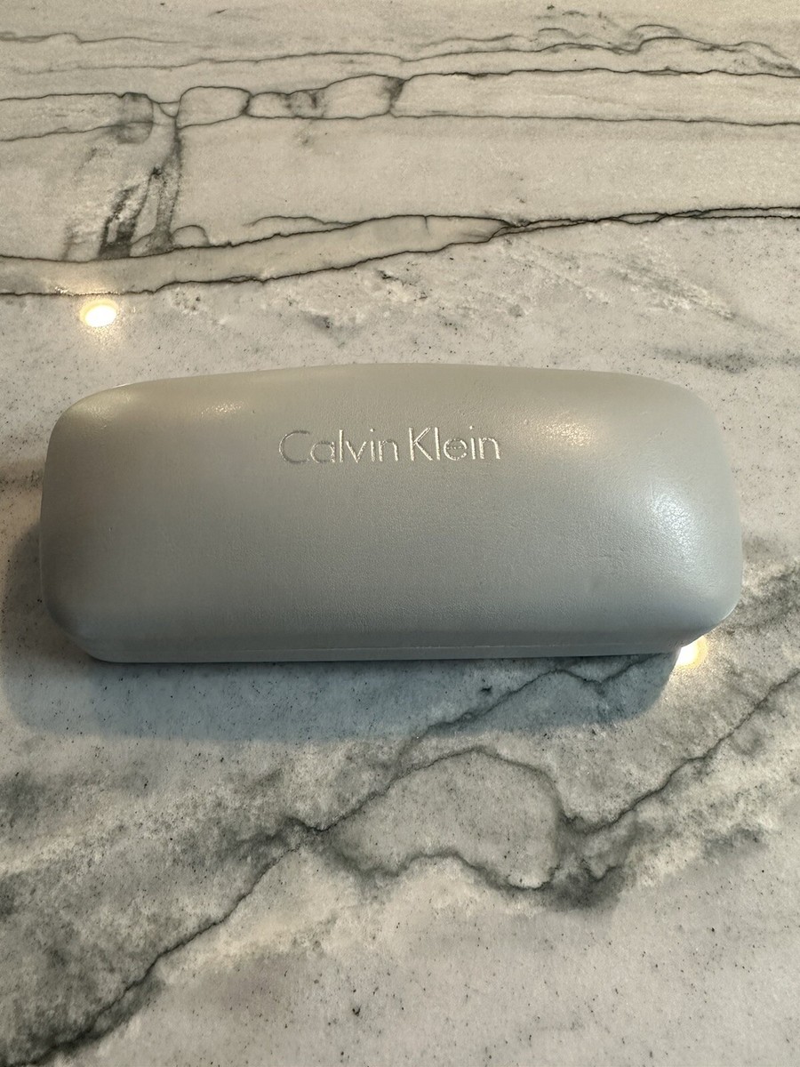 CALVIN KLEIN White Faux Leather Hard Clam Shell Sunglasses