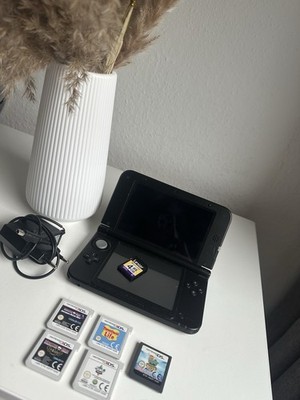 Nintendo 3DS XL Schwarz + Zubehör Paket (4GB SD-Karte + Ladegerät + 5 Spiele)