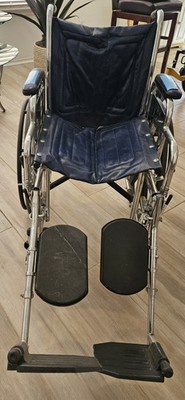 Blue Wheelchair with removable footrest Tracer EX Invacare