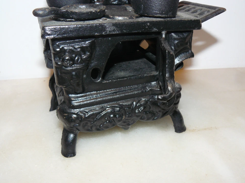 Gaziniere cuisiniere ancienne en fonte, jouet - Photo 2/4
