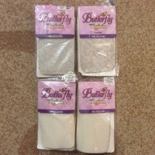 4 pairs Girls fashion tights. Size 12-14. Ivory