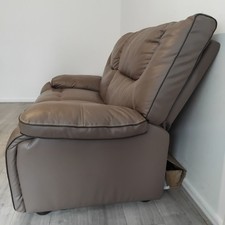 SOFA: Preloved seat brown sofa with two seater capacity.