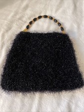 black evening bag With Beaded Handle And Snap Closure