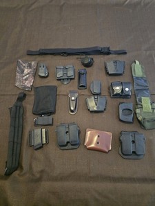 Assorted Gun Items, Magazine Holders, Sheathed. Speed Loader Carrier Etc