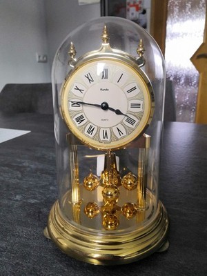 Kundo Quartz Drehpendeluhr Kaminuhr Römisches Zifferblatt Gold Batteriebetrieb