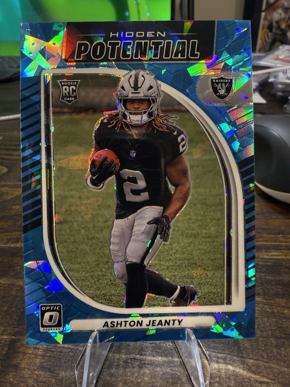 2025 Optic Football Ashton Jeanty Hidden Potential Blue Cracked Ice /55