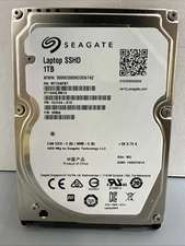Seagate 1TB SSHD - Hybrid SSD ST1000LM014 P/N: 1EJ164-310 F/W: SM36