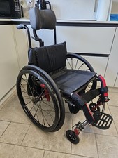 Ti-Lite lightweight Wheelchair.  Topoling Carbon Wheels.