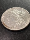 1883 MORGAN SILVER DOLLAR ALMOST UNCIRCULATED