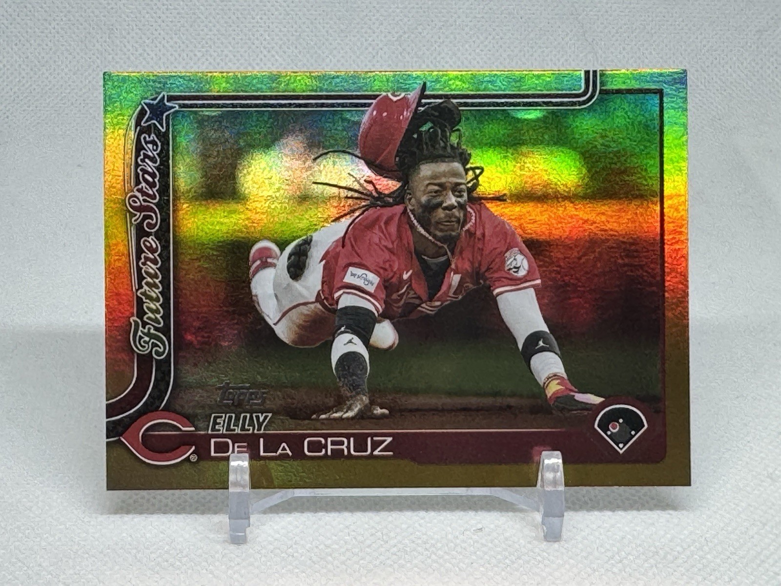 Elly De La Cruz /50 - 2025 Topps Series 1 Future Stars Rainbow Gold Foil #150