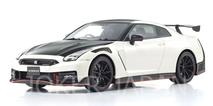 Литые модели автомобилей, грузовиков и фургонов Kyosho Nissan