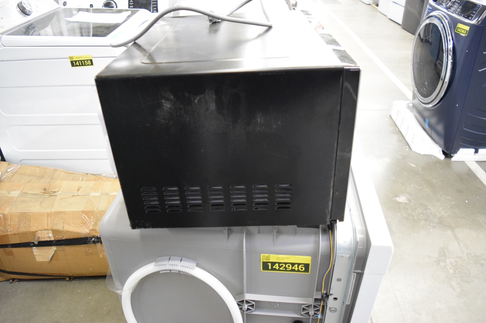 GE JES1657SMSS 22" Stainless 1.6 cu. ft. Countertop Microwave Oven ASIS