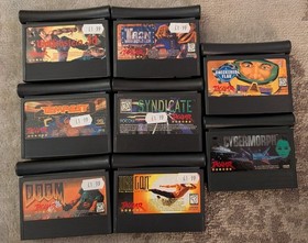 Boxed Atari Jaguar Console with 8 Games, spare controller and instructions.