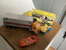 2 Disney Pixar Transporters With Cars. Sidewall Shine 74/ Peterbilt