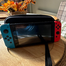 Nintendo Switch Console Handheld System with Neon Red/Blue Joy-Con, USB-C