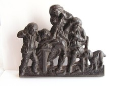 Antico fermaporta vittoriano in ghisa gruppo famiglia e cane