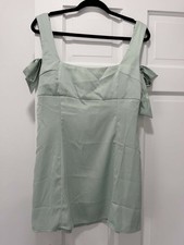 Urban Outfitters sage green mini dress with bow detail. Size L