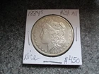 1884's MORGAN SILVER DOLLAR  in VERY NICE WHITE HIGH AU condition. NICE DATE!