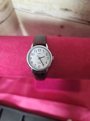 Timex Indiglo Silver Analog Ladies Watch Sz. 6'' White Dial, Black Strap.