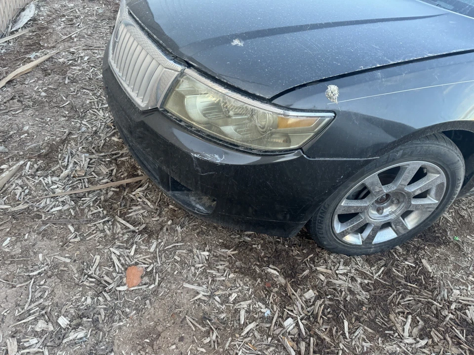 For Lincoln Zephyr 2006 Bumper Cover Front Black  OEM - Image 2 of 3