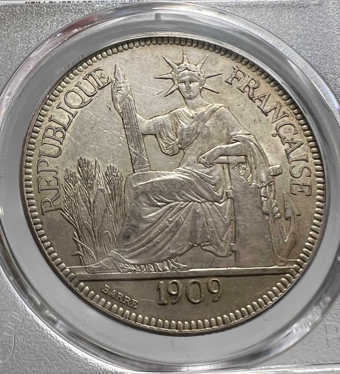 1909 French Indo China Piastre PCGS AU55 Silver Coin 1P