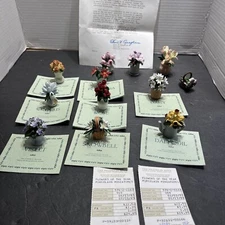 FLOWERS OF THE YEAR Franklin Mint Porcelain Collectibles Set of 12 flowers.
