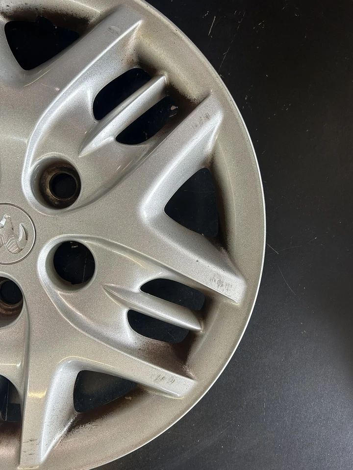 Cubierta de rueda tapacubos Dodge Caravan 2001-2005 15" OEM. 04766971AA Foto 2 de 4