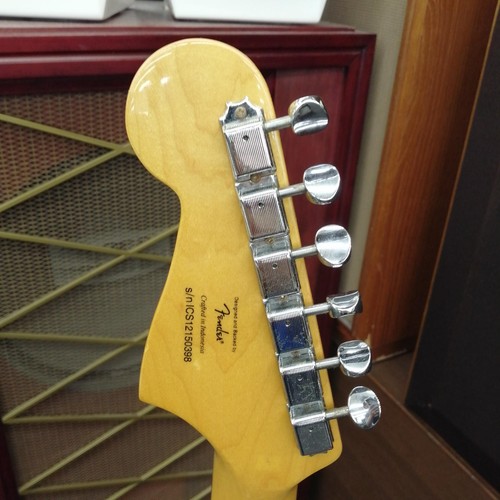 Squier Vintage Modified Jazzmaster with silver hardware, chrome strings, and yellow body, safe delivery from Japan.