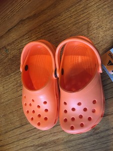 orange classic crocs