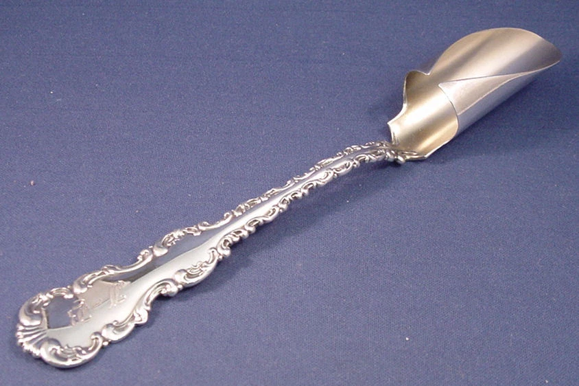 LOUIS XV-WHITING STERLING LARGE CHEESE SCOOP