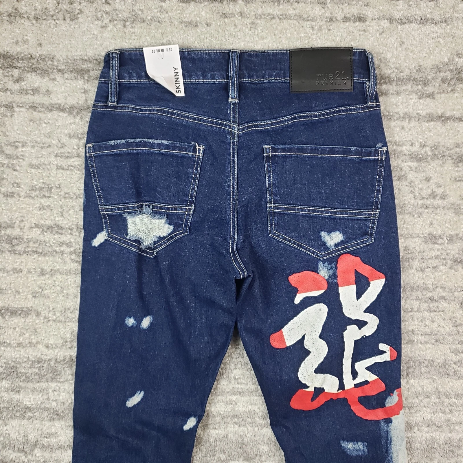 Rue 21 jeans homme 26x30 Supreme Flex maigre graffiti en détresse mesure 27x30