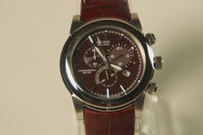 Imagen de citizen eco-drive mens watch brown face, brown leather strap w/white stitching