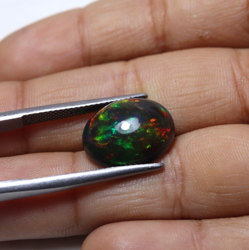 4,9 ct 15 x 11,9 mm natürlicher AAA auffälliger Multi Feuer geräuchter schwarzer äthiopischer Opal oval - Bild 5 von 10