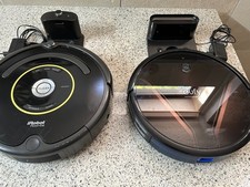Zwei Stück Saugroboter iRobot/Gufy mit Ladestation