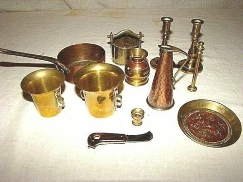 Poupées anciennes en métal