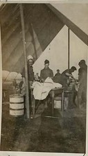 WW1 Photo U.S. Base Camp Cooks Under Tarp Block Of Cheese France