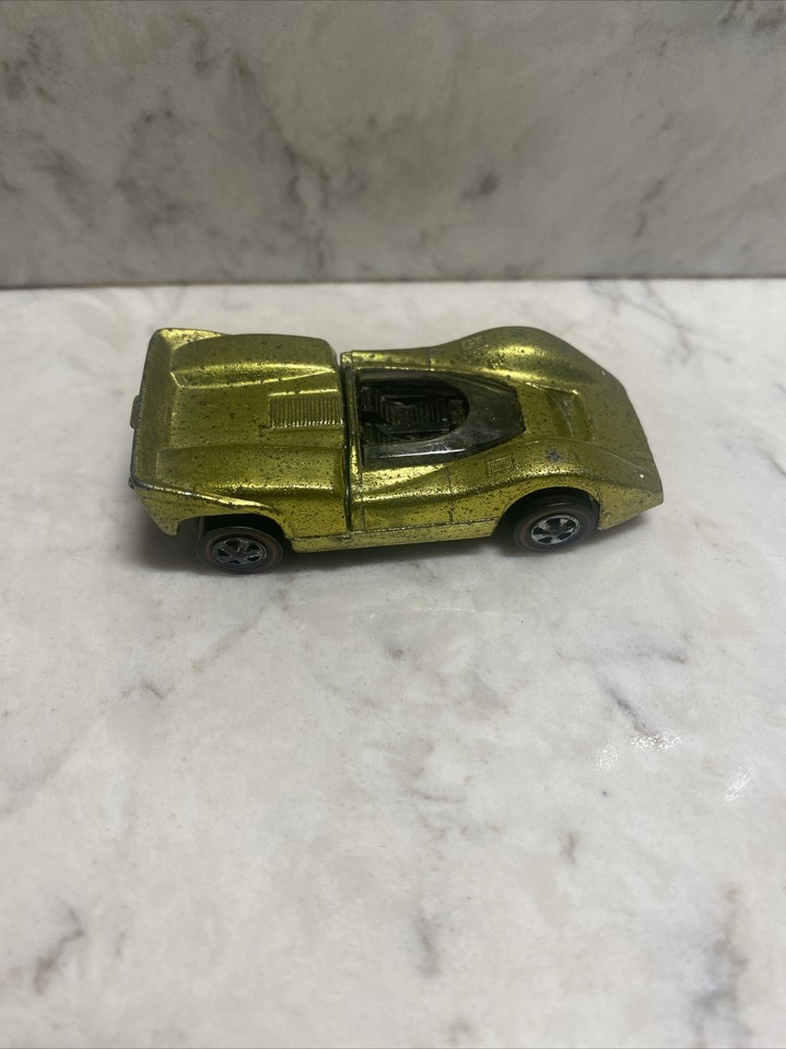 McLaren M6A - Hot Wheels Mattel 1968 avec bouton