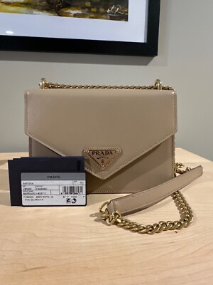 BRAND NEW WITH TAGS Prada Saffiano Leather Envelope Bag in the color Cammeo 