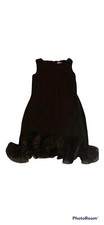 Calvin Klein little black dress with structured ruffles at the hem. Stunning!
