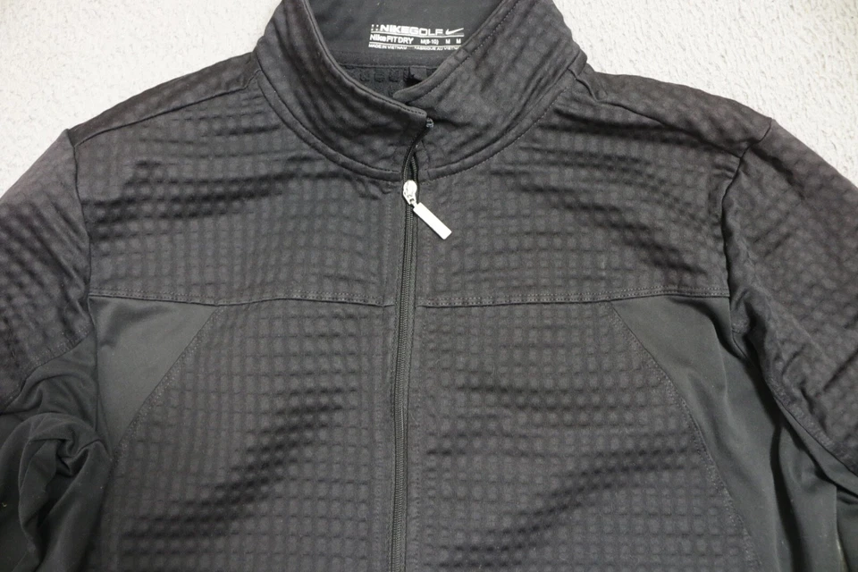 Chaqueta de golf Nike Fit seca para mujer mediana negra forrada con gofres Foto 2 de 4